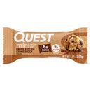 A chocolate chip cookie dough flavored protein bar wrapper displays the brand name "Quest," highlighting 8g of protein and 2g of net carbs per 0.81 oz bar, with a cookie dough image beside it.