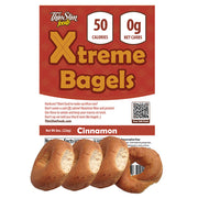 A package of Thin Slim Foods Xtreme Bagels in cinnamon flavor, featuring four bagels at the bottom, with a label highlighting 50 calories and 0 net carbs.
