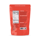 A bright red packaging displays the back of a snack product, featuring nutrition facts, ingredients, and promotional text about its health benefits and historical context, labeled as gluten-free and no sugar added.