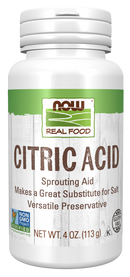 A white bottle labeled "Citric Acid" from NOW Real Food, featuring information about its use as a sprouting aid and salt substitute, with a 4 oz. net weight and non-GMO certification.
