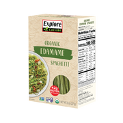 A box of Explore Cuisine Organic Edamame Spaghetti features a plate of cooked spaghetti with vegetables, highlighting its high protein content of 42 grams per serving on the side.