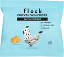A light blue snack bag labeled "flock Chicken Skin Crisps Salt & Vinegar" features a cartoon chicken and highlights nutritional information, including 13g protein and 0g sugar per serving.