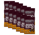A collection of Hershey's Zero Sugar caramel-filled chocolate candy bags, prominently displaying the brand name and product details, arranged in a stacked formation against a plain background.