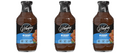Three bottles of G. Hughes Hickory Flavored BBQ Sauce are displayed side by side, each featuring a black and blue label with the text "Zero Sugar" and images of glazed ribs.