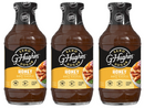 Three bottles of G. Hughes Honey Flavored BBQ Sauce are displayed side by side, featuring a black label with yellow accents, highlighting that the sauce is zero sugar, gluten-free, and dairy-free.