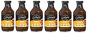 Six bottles of G. Hughes Honey Flavored BBQ Sauce are lined up, each featuring a label that highlights "Zero Sugar," "Gluten & Dairy Free," and nutritional information on a yellow background.