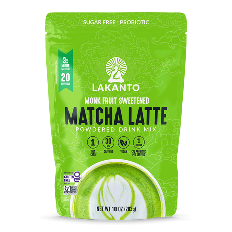Bright green packaging of Lakanto Monk Fruit Sweetened Matcha Latte powdered drink mix features a decorative design, product name, and highlights like sugar-free, vegan, and probiotic benefits.