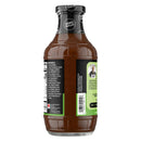 A brown sauce bottle labeled "Zero Sugar" displays ingredient details and a photo of a chef, suggesting it's a low-sugar condiment suitable for dipping or enhancing meals.
