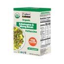 A green box of Explore Cuisine Organic Edamame & Mung Bean Fettuccine displays a bowl of the pasta, highlighting its high protein content and simple ingredients, with nutrition facts on the side.