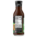 A brown bottle of zero sugar sauce displays nutrition facts and ingredients on its label, indicating it contains 5 calories per serving and about 20 servings per container.