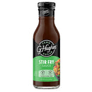 A bottle of G. Hughes Zero Sugar Stir Fry Sauce, featuring a dark brown liquid, a green label indicating it's gluten and dairy-free, and nutritional information on the front.