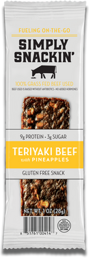 A packaged snack featuring a teriyaki beef jerky bar with pineapple pieces, labeled "Simply Snackin'," highlighting its gluten-free and grass-fed beef qualities.