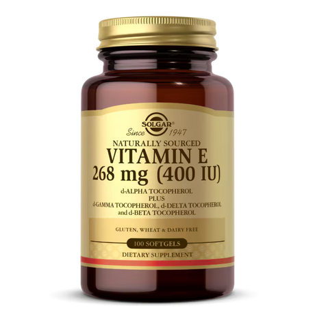 A dark amber bottle of Solgar Vitamin E, labeled "Naturally Sourced 268 mg (400 IU)," contains 100 softgels and highlights gluten, wheat, and dairy-free ingredients.